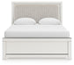 Zuraleus Queen Upholstered Panel Bed, Dresser, Mirror, Chest and Nightstand