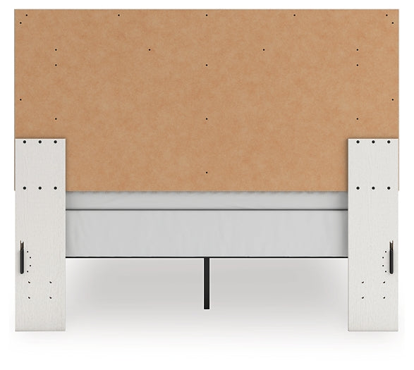 Zuraleus Queen Upholstered Panel Bed, Dresser, Mirror, Chest and Nightstand